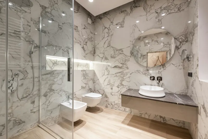 Luxury bathroom with marble tile walls