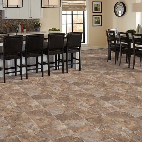 Rustic tile look LVT flooring in a dining area of a Glendale AZ home