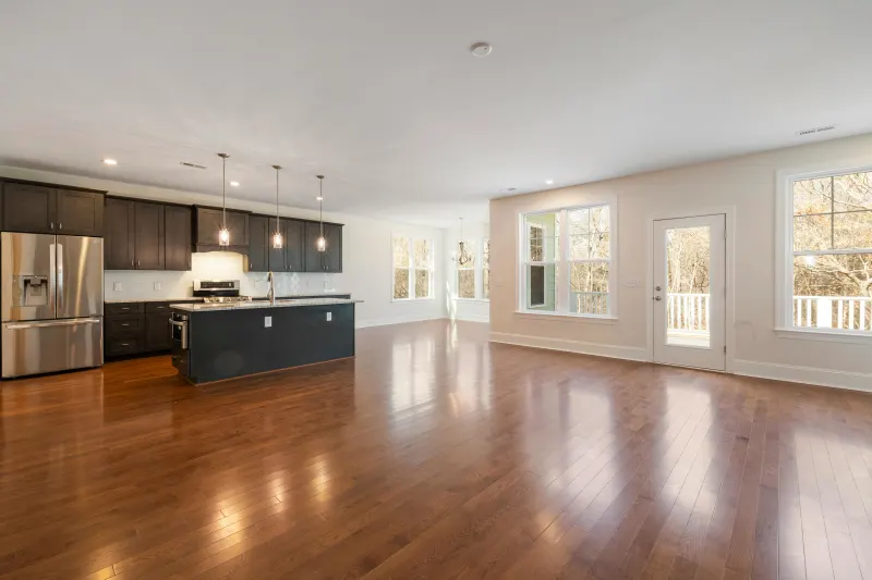 Warm Luxury Vinyl flooring in an open concept kitchen