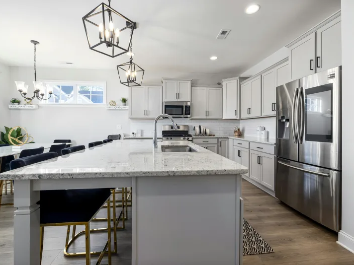 Granite countertops in a traditional style kitchen by Cost Plus 20