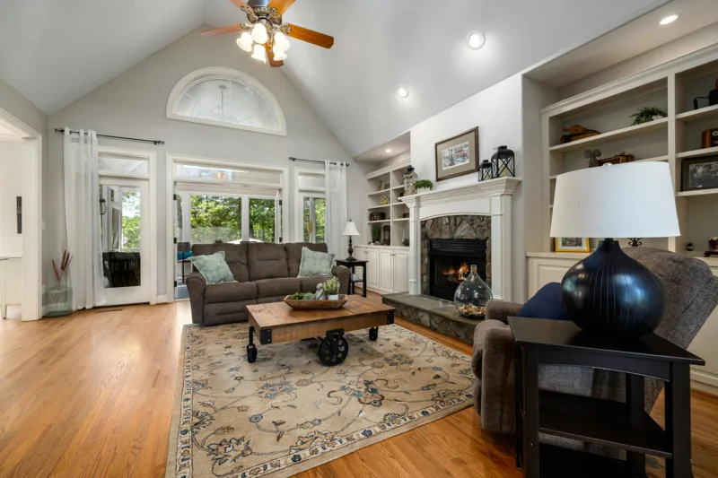 Cozy and traditional living room with wood look flooring
